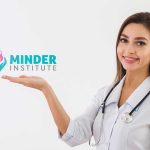 Nurse holding Minder Institute Logo